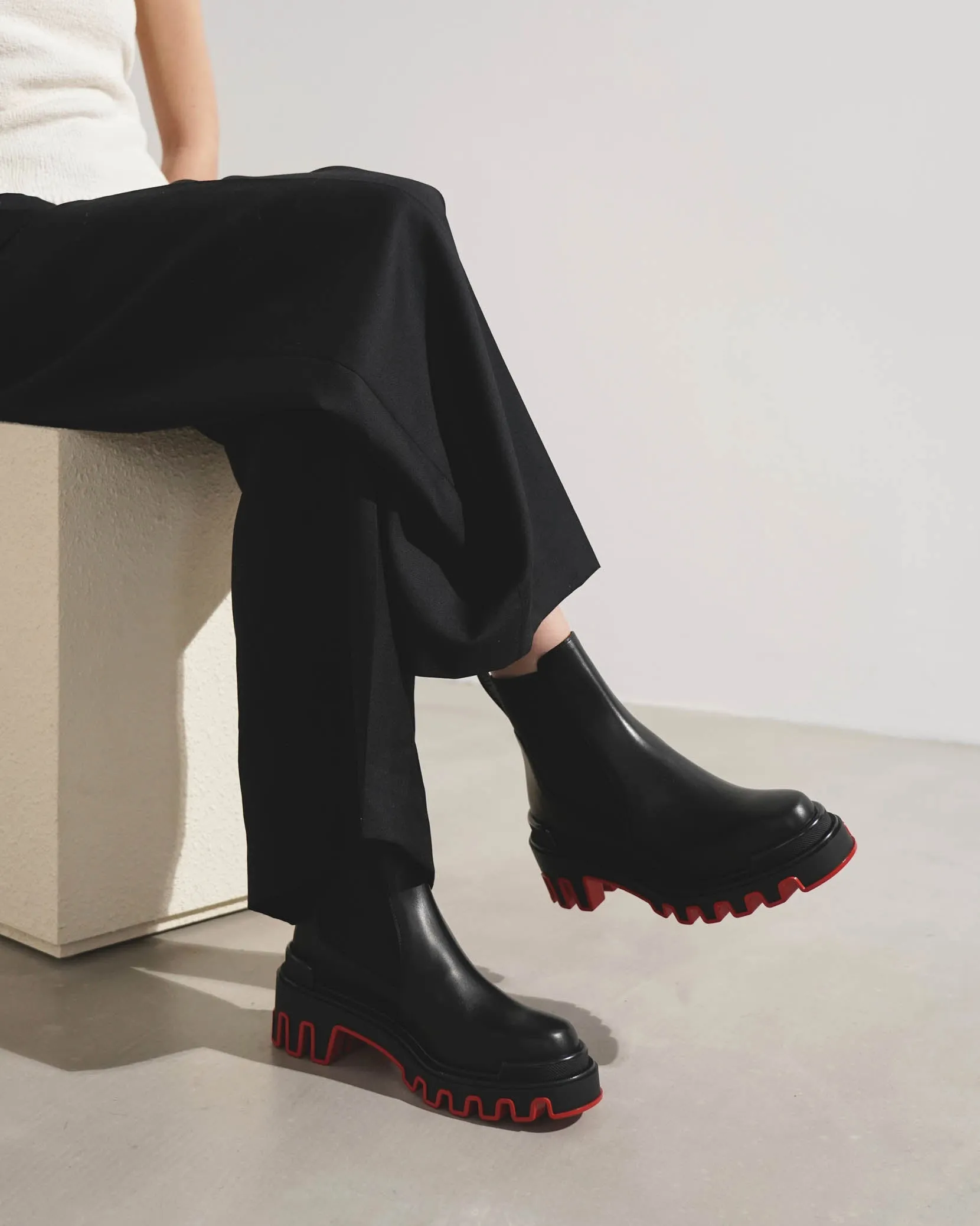 Marchacroche black leather ankle boots
